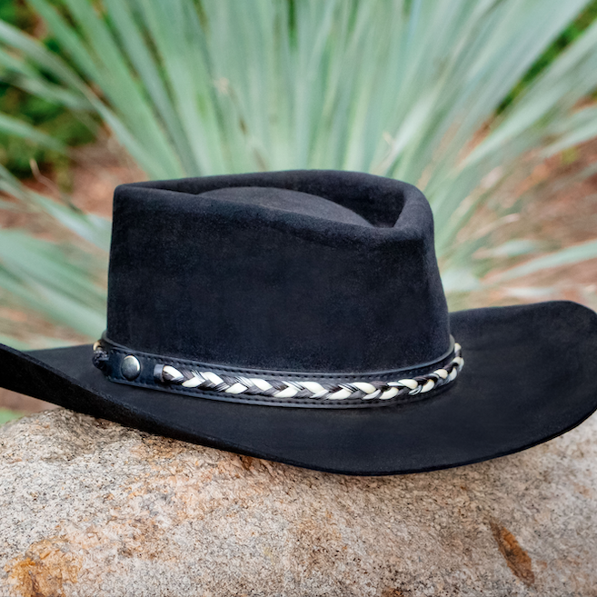 Black leather hat band on black cowboy hat