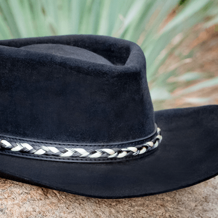 Black vegan leather horsehair hat band on black cowboy hat